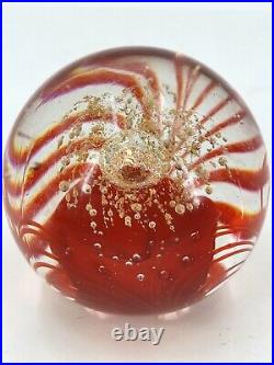 1960's Italian clear and red Murano glass paperweight with gold fleck infused