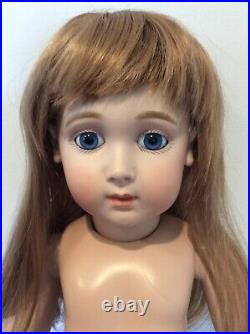 25 Antique Reproduction of a Long Face Jumeau with Blue Glass Paperweight Eyes