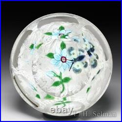 John Deacons (2022) butterfly over blue clematis faceted glass paperweight
