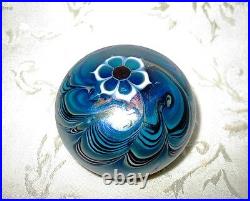 Signed Lundberg Studio Art Glass Iridescent Paperweight with a Floral Design